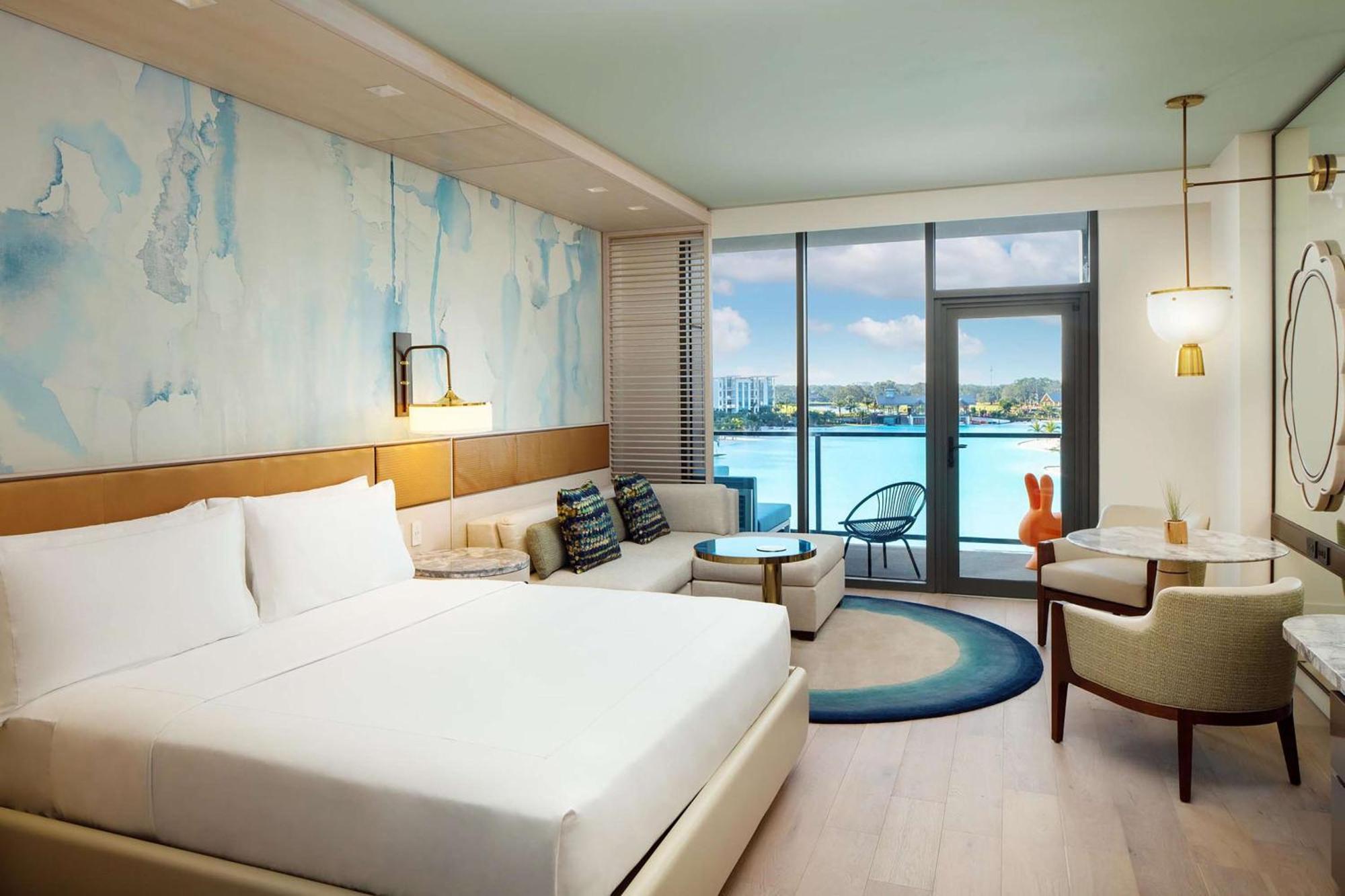 King Room with Roll-In Shower and Balcony - Mobility Accessible